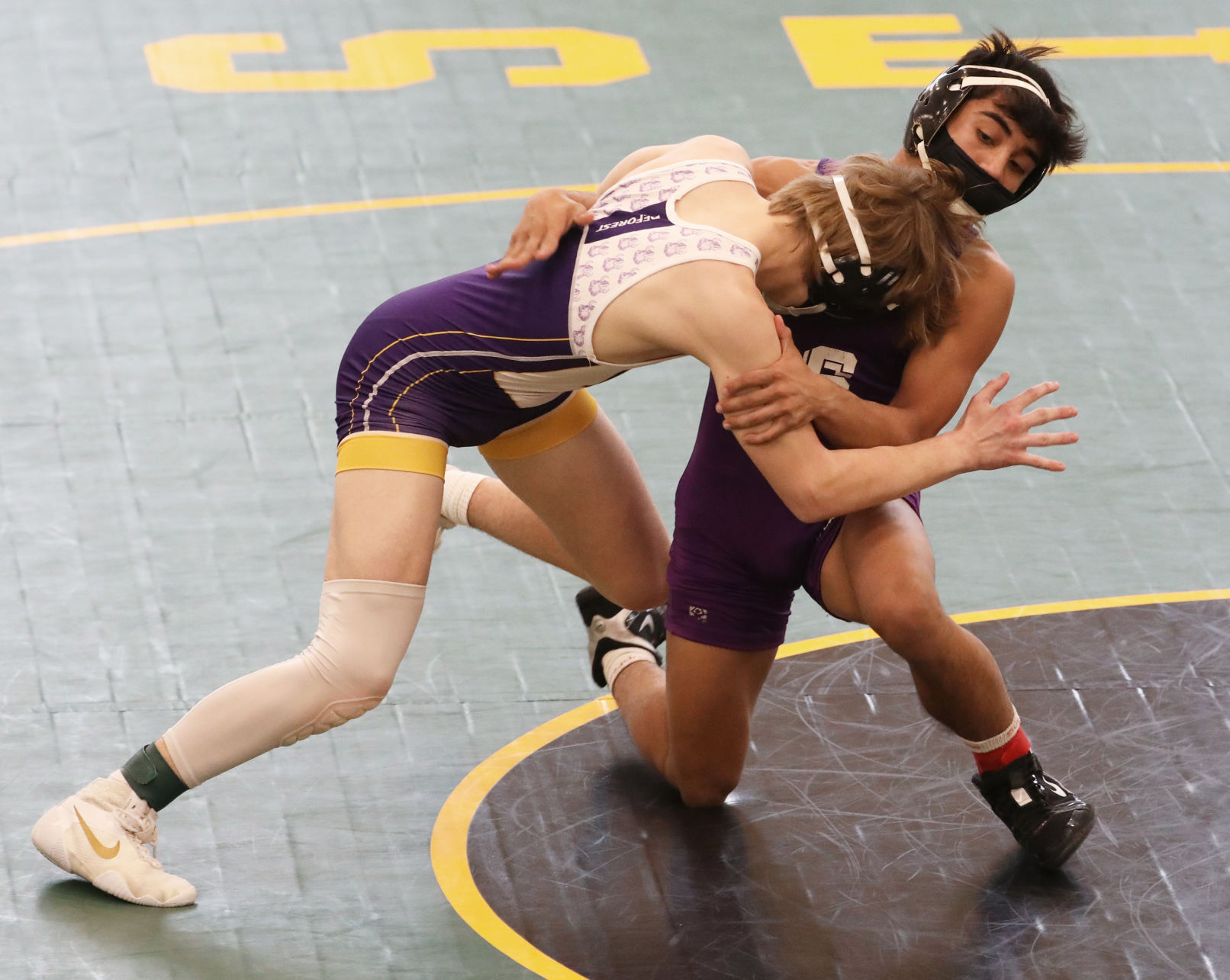 WIAA wrestling photo: Stoughton's Nicolar Rivera, DeForest's Luke Barske